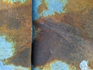 rusty and old metal coating of different colors from metal corrosion.