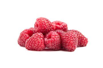 Fresh raspberries bunch isolated on white background. Heap of red raspberries