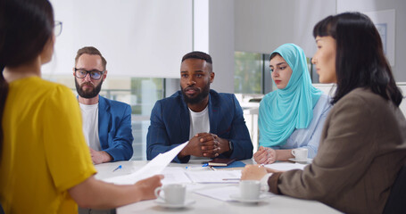 Mixed business people having corporate meeting brainstorming new ideas