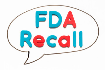 Alphabet letter with word FDA recall in black line hand drawing as bubble speech on white board background