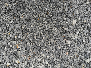 Abstract background with pebbles small round sea stones Beach rocks Texture material nature, Rock the specifics, grey black color