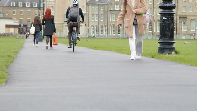 Long Shot of Cyclists and Pedestrians In Parkers Piece 