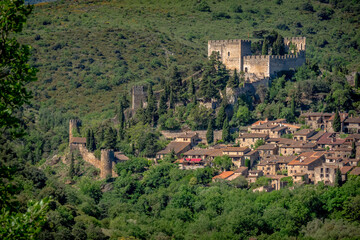 Fototapeta na wymiar Castelnou village with the Mont canigou in the Background during the springtime - Another one of the Olus Beaux Villages de france