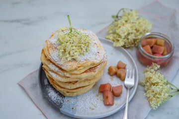 sweet home made pancakes with rhubarb and elderflower