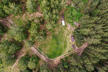 Top view of the logging camp on a summer day
