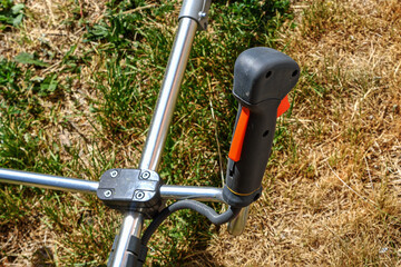 Gas trimmer control knob close-up