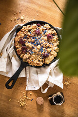 vegan cherry crumble in a skillet