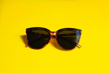 Sunglasses on a yellow background