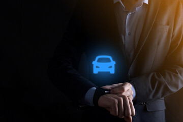 Digital composite of Man holding car icon.Car automobile insurance and car services concept. Businessman with offering gesture and icon of car.