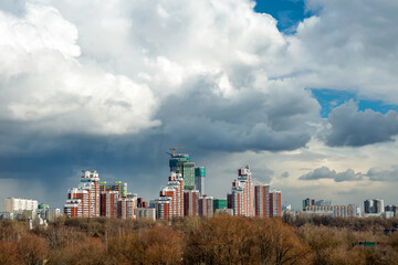 Fototapeta na wymiar MOSCOW - APRIL 3, 2021: View of residential buildings in the Khoroshevo-Mnevniki area on a spring day.