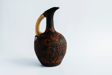 standing; Special wine jug for the Caucasus region with its wonderful decorations.   isolated
