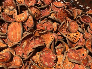 Dried bael fruit background. Close up dried herb. Many of slices of bael fruit .