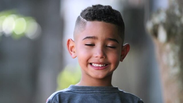 Hispanic child little boy portrait. Brazilian kid smiling
