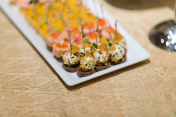 buffet food, catering food party at restaurant, mini canapes, snacks and appetizers