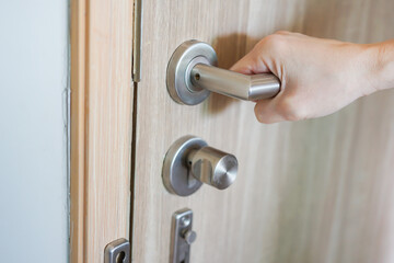 A hand to opening/close door knob, Home Security and Safety Background Concept