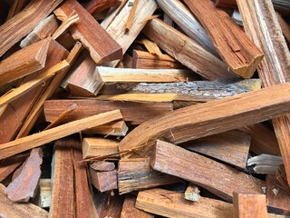 Organic Pathimukham or Sappan wood (Caesalpinia sappan) chips.  Dried wood has medicinal properties.