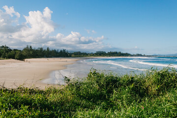Late afternoon on a Brazilian beach at 18:27 with lots of green and almost deserted to walk and exercise - Travel and lifestyle