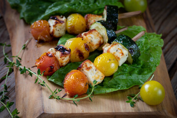 Grilled halloumi barbecue with tomatoes and zucchini
