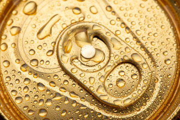 Metal cans of beer, close up. Drops of water on a cold can of drink. Alcoholic beverage.