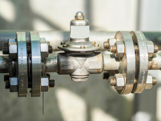 Pressure regulator for control pressure in water line at power plant.