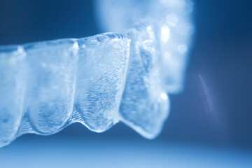Invisible bracket aligners