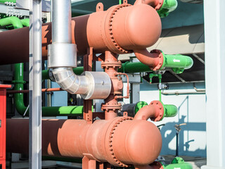 Heat exchanger systems for cooling oil temperature of gas turbine generator systems in power plant.