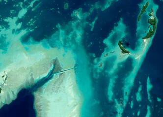 Satellite view of Palau, Micronesia, south island, uninhabited atoll. Crystalline, transparent and...