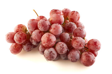 a bunch of red grapes on a white background