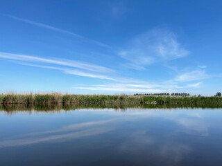 Fototapeta na wymiar Quiet canal in Friesland