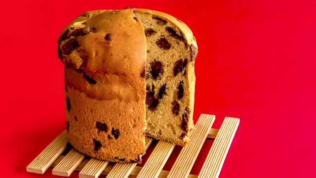 Stop motion panettone chocottone on red background.