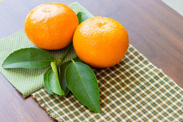 Oranges are fruits that are high in vitamin C. Background for banner Poster.