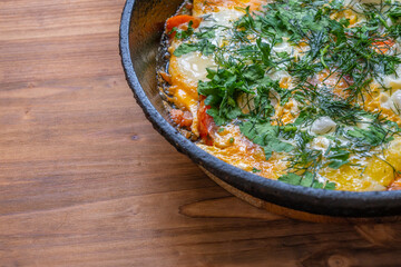 Poached eggs with tomatoes and spices