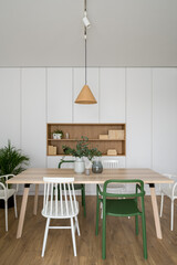 Simple dining table with various chairs