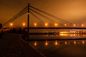 night city with reflection of houses in the river