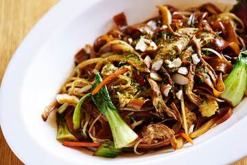 Fried noodles with various ingredients 