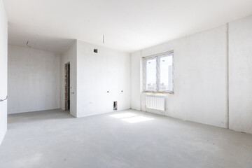 interior of the apartment without decoration in gray colors