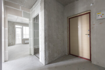 Fototapeta na wymiar interior of the apartment without decoration in gray colors