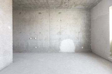 interior of the apartment without decoration in gray colors
