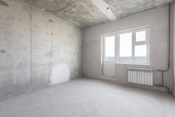 interior of the apartment without decoration in gray colors