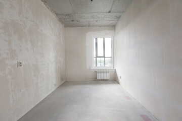 interior of the apartment without decoration in gray colors