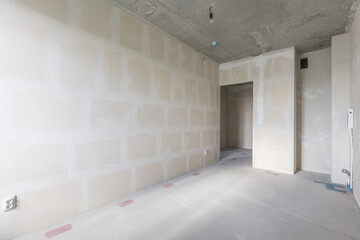 interior of the apartment without decoration in gray colors