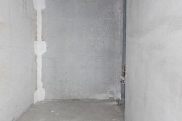 interior of the apartment without decoration in gray colors