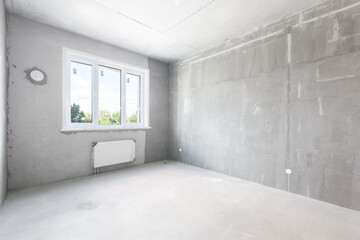 interior of the apartment without decoration in gray colors