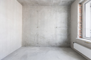 interior of the apartment without decoration in gray colors