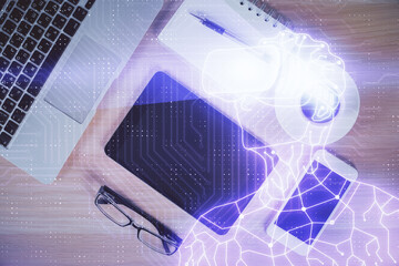 Double exposure of drawing man in AR glasses over table with phone. Top view. VR concept.