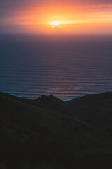 Sun setting on the atlantic ocean from the top of Jaizkibel hills