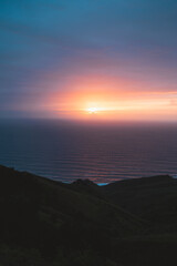 Sun setting on the atlantic ocean from the top of Jaizkibel hills
