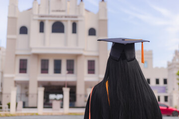 New graduates wear graduation caps to celebrate their graduation at university.