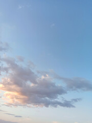 sky background with beautiful sky-blue clouds. air texture vertical image