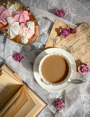 Vintage style still life with coffee and books